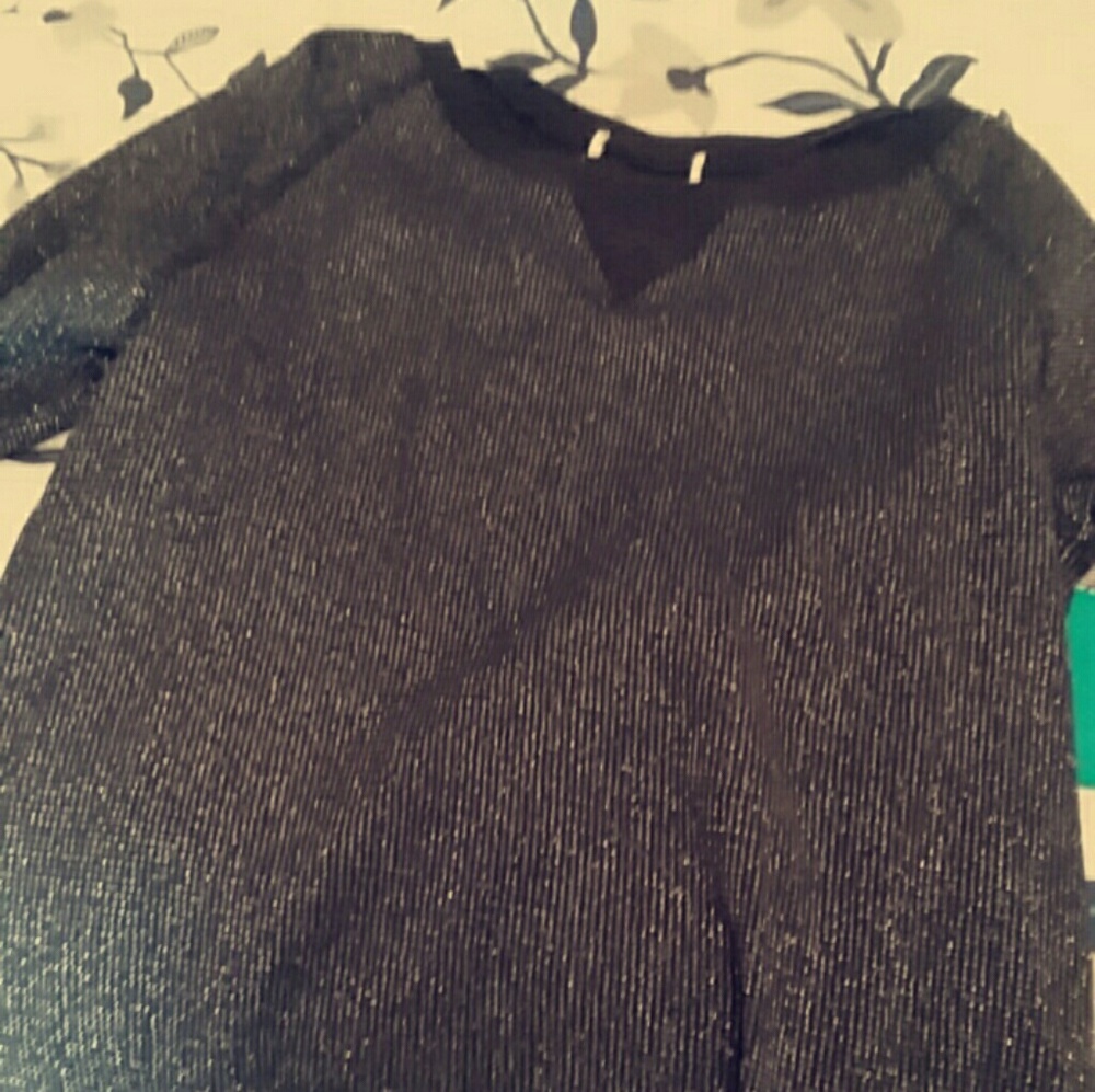 Black and shiny sweater